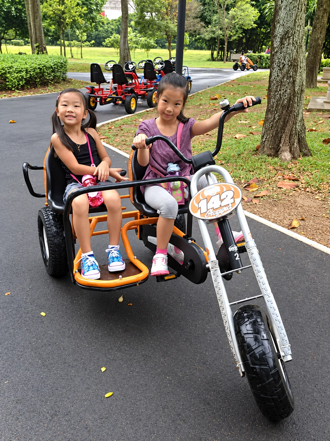 Young riders taking part in a pedal go-kart activity in Singapore