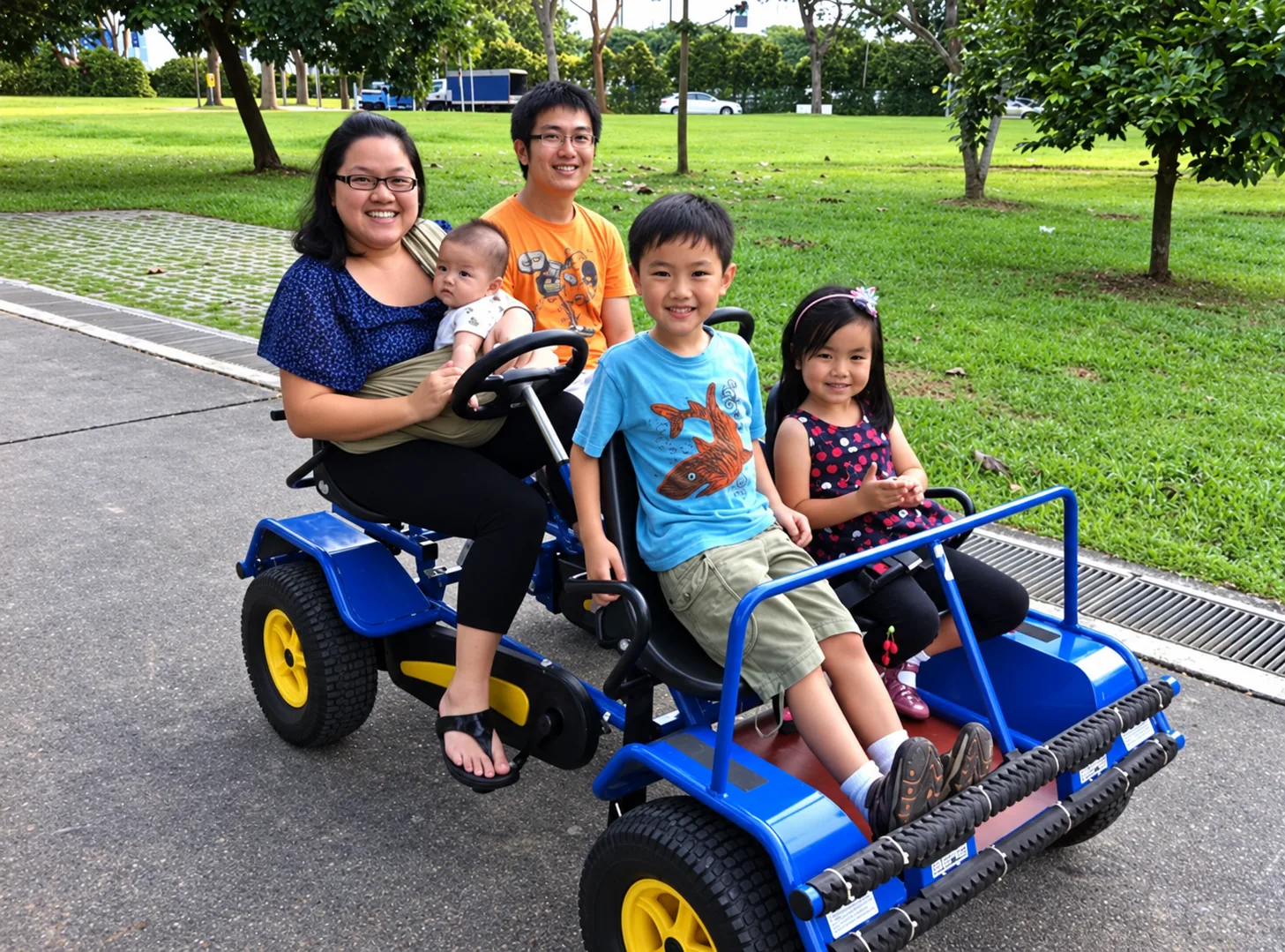 Family enjoying a pedal go-kart activity in Singapore